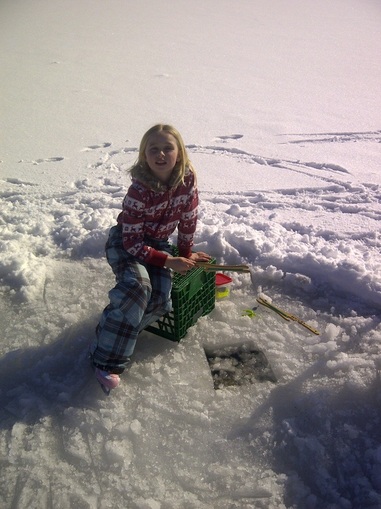 Catching more fish than her brothers at her Winter Cottage Vacation